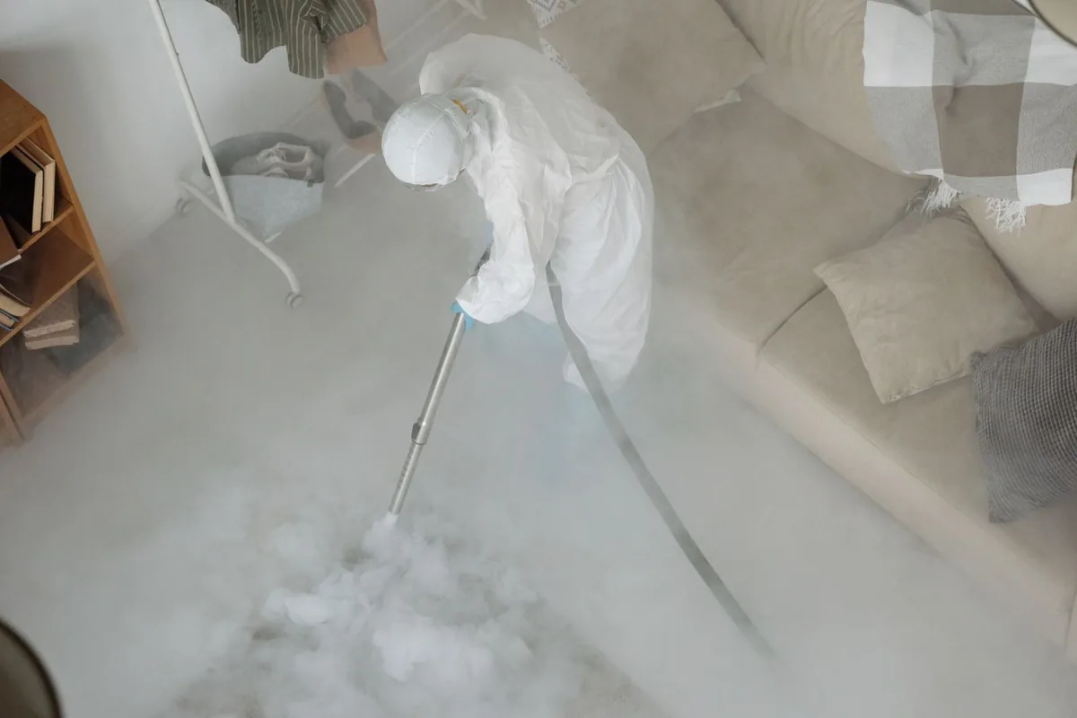 Biohazard cleanup technician in protective equipment, Washoe Valley, NV